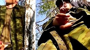 Russian soldier with a big dick more than a military mission in a difficulty forest shoots sperm from his penis at opponents