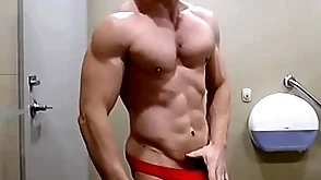 Hung bodybuilder flexing shirtless in in flames cock sox briefs zak rogerz