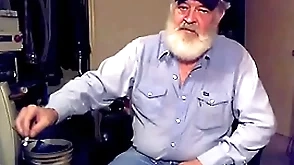 Making a piss off on some blue plaid boxers