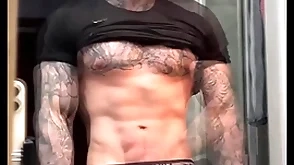 Stroking my massive cock and flexing for you at the cumming