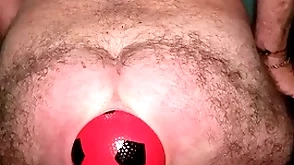 World record 13 cm wide anal dilation with inflatable ball.