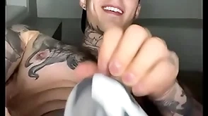 Jakipz in a athlete strap playing yon his crumple plus cumming
