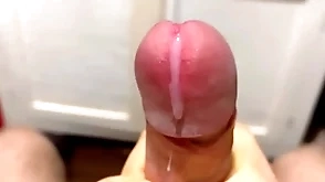 Cumming in close-up with a massive portion be expeditious for cum in slow process / big uncut veiny cock / pissing